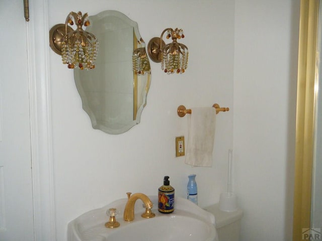 bathroom featuring a sink and toilet