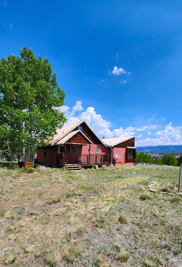 997 Wells Fargo Cir, Jefferson, CO 80456 - view of yard featuring a deck