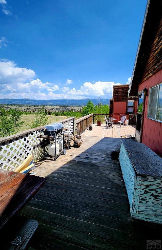 997 Wells Fargo Cir, Jefferson, CO 80456 - wooden deck featuring grilling area