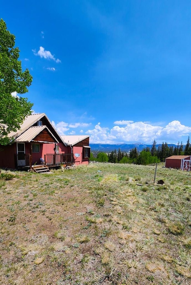 997 Wells Fargo Cir, Jefferson, CO 80456 - view of yard with a shed