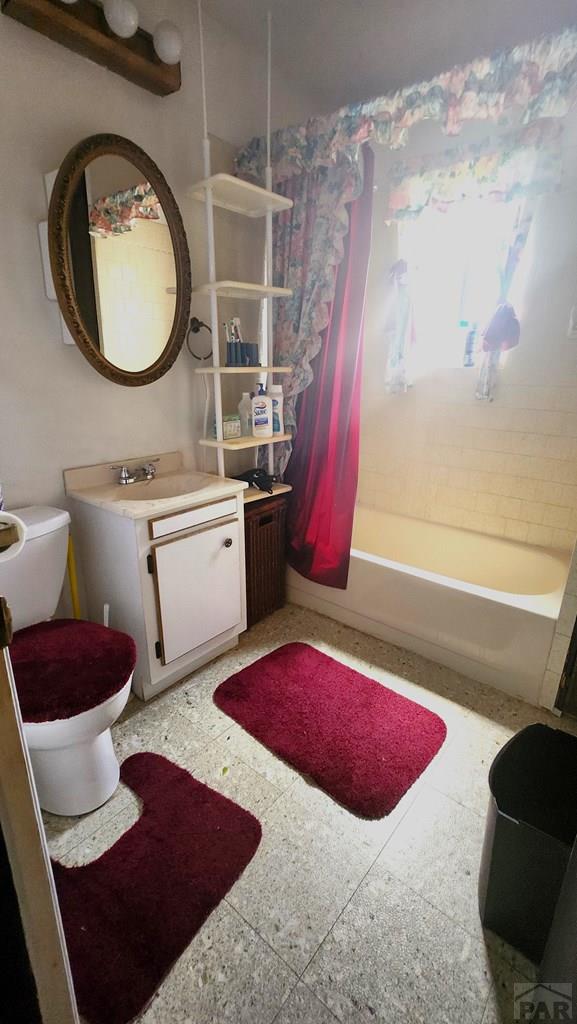 997 Wells Fargo Cir, Jefferson, CO 80456 - full bath with vanity and shower / bath combination with curtain