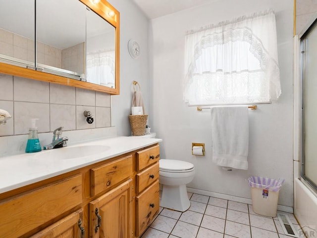 1505 Center Ln, Pueblo, CO 81006 - full bathroom with vanity, decorative backsplash, and tile patterned floors
