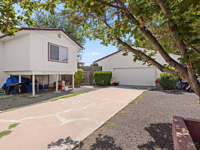 1505 Center Ln, Pueblo, CO 81006 - view of property exterior with a garage and concrete driveway
