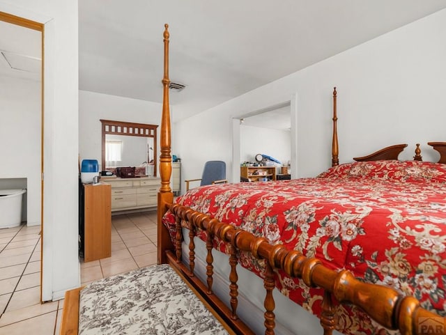 1505 Center Ln, Pueblo, CO 81006 - bedroom featuring light tile patterned floors and ensuite bath
