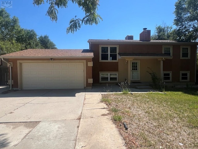 view of front facade with a garage, concrete driveway, stucco siding, a front lawn, and a chimney