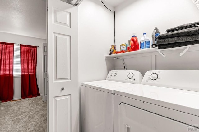4141 Outlook Blvd Unit Q, Pueblo, CO 81008 - laundry room featuring independent washer and dryer and carpet floors