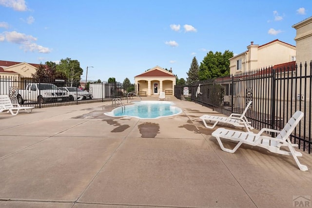 4141 Outlook Blvd Unit Q, Pueblo, CO 81008 - community pool with a patio area