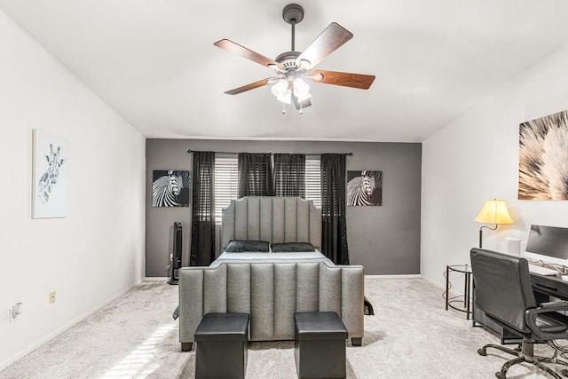 4141 Outlook Blvd Unit Q, Pueblo, CO 81008 - carpeted bedroom featuring a ceiling fan and a desk