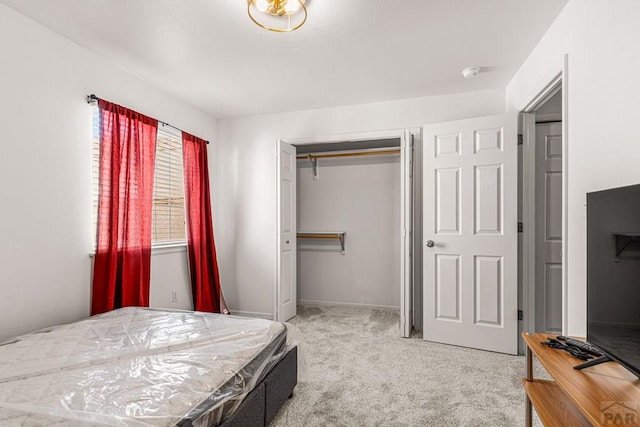 4141 Outlook Blvd Unit Q, Pueblo, CO 81008 - carpeted bedroom with a closet