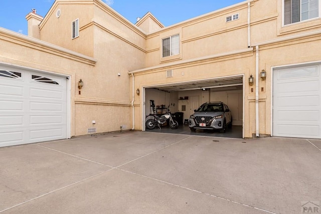 4141 Outlook Blvd Unit Q, Pueblo, CO 81008 - garage with driveway