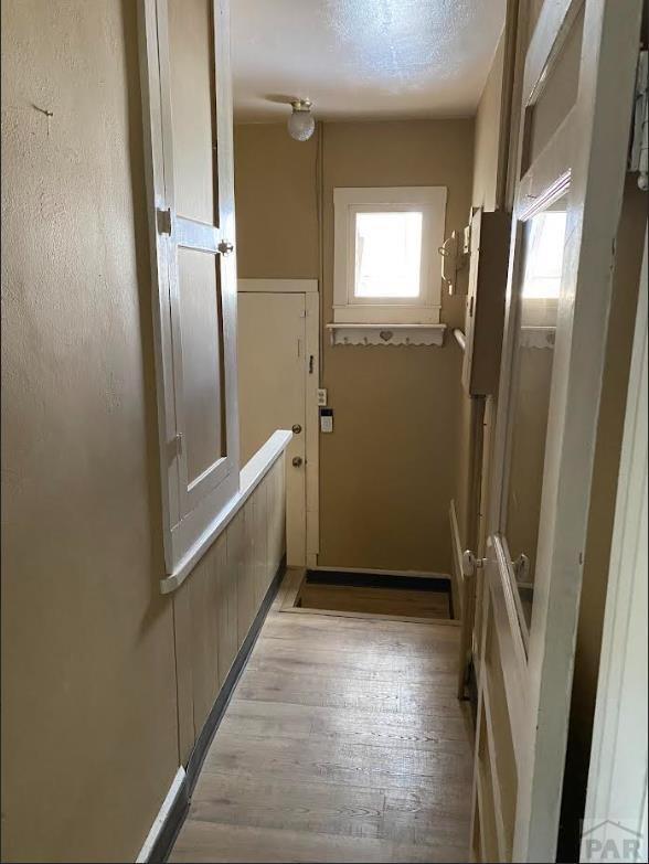 doorway featuring light wood-type flooring