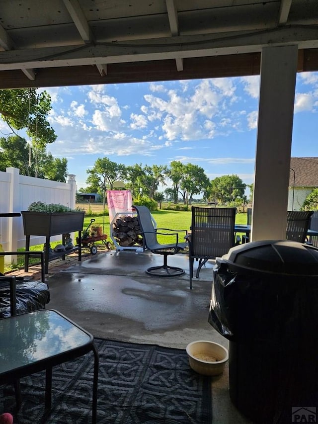 view of patio with fence and grilling area