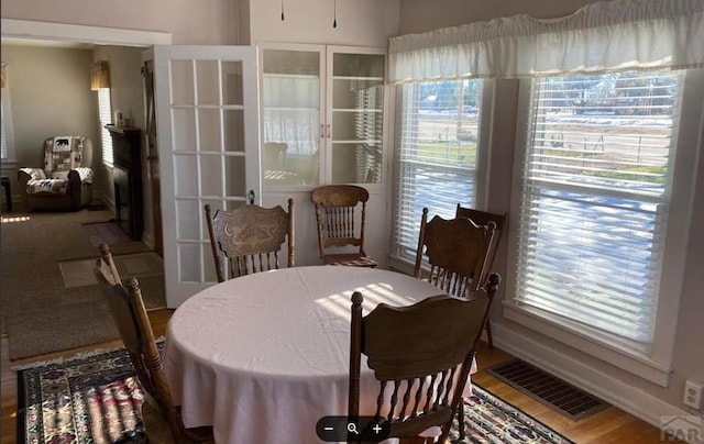 dining space featuring visible vents