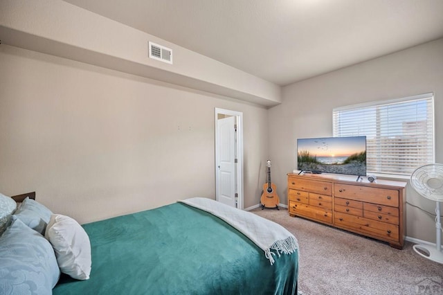 2337 Cruz Ct, Pueblo, CO 81003 - bedroom featuring light carpet and baseboards