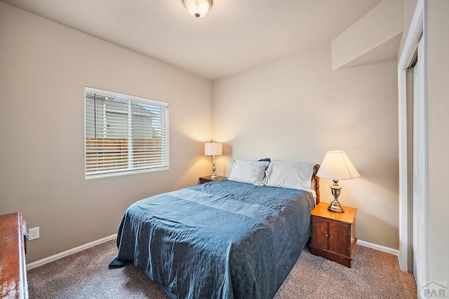 2337 Cruz Ct, Pueblo, CO 81003 - bedroom featuring carpet and baseboards