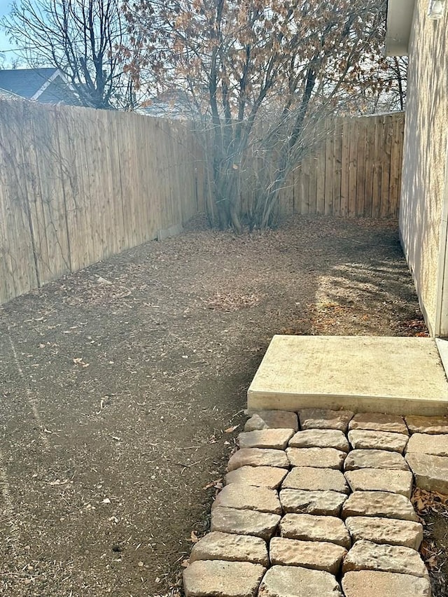 view of yard featuring a fenced backyard