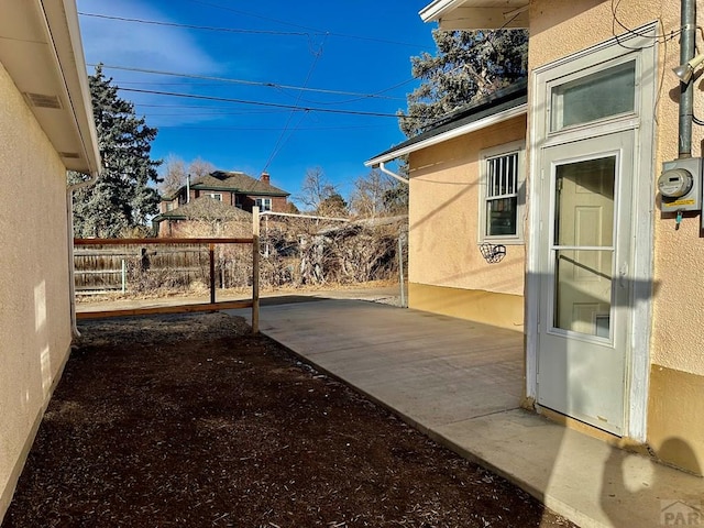 view of yard with a patio and fence