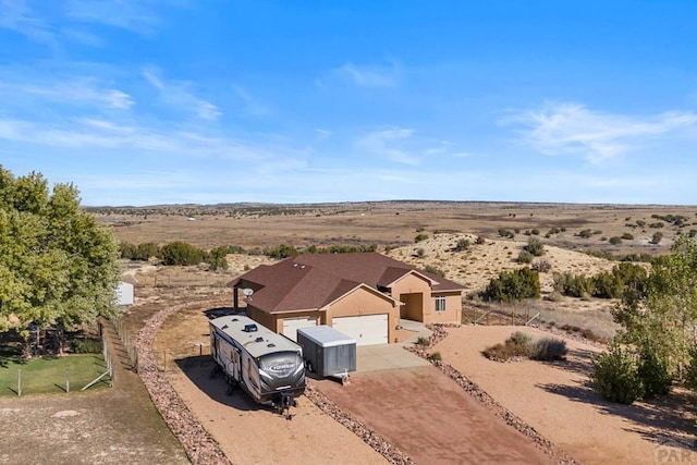 aerial view featuring view of desert