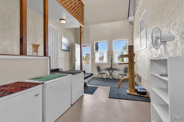 laundry area with washing machine and dryer