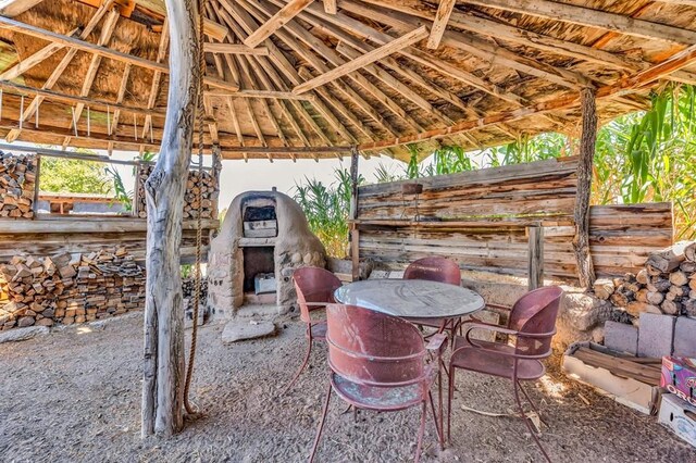 view of patio / terrace featuring an exterior structure