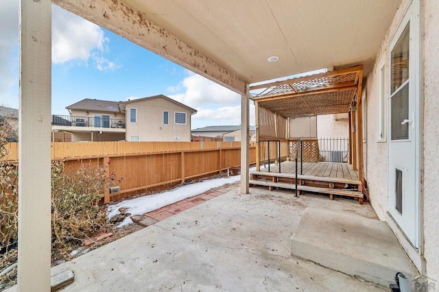 view of patio / terrace featuring fence