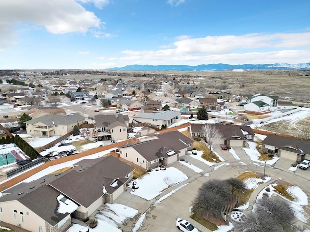 aerial view with a mountain view and a residential view