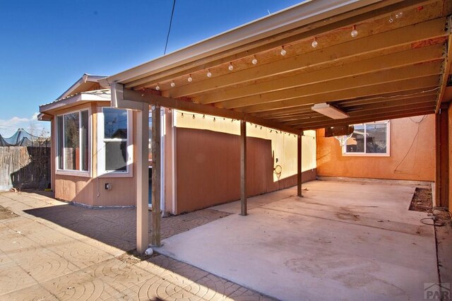 view of patio / terrace with fence