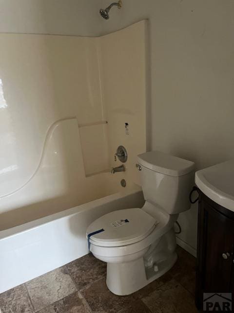 full bathroom featuring  shower combination, toilet, and vanity