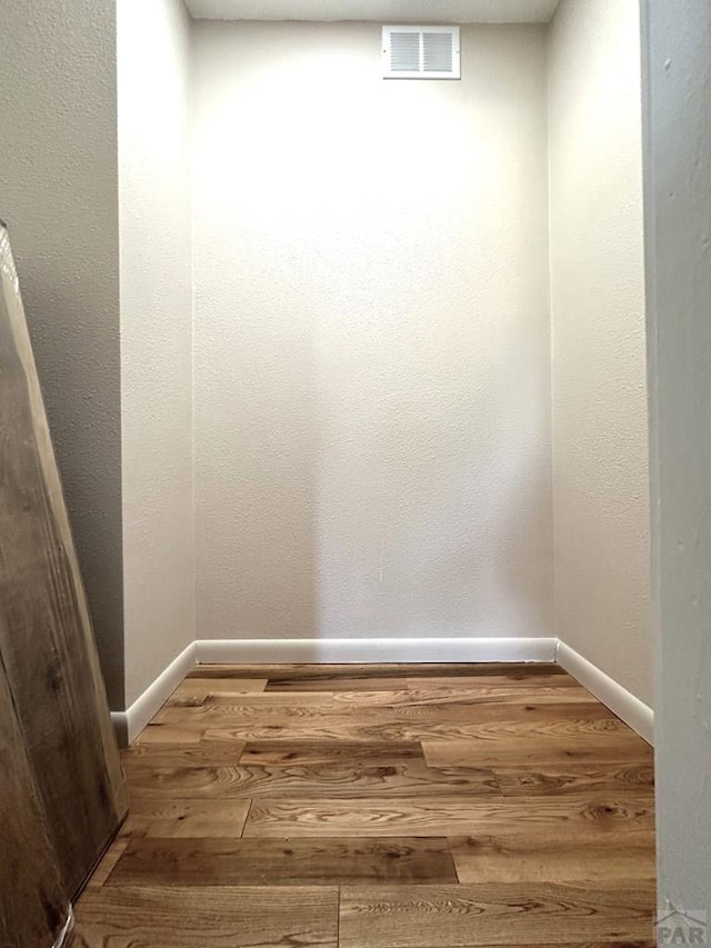 519 Broadway Ave, Pueblo, CO 81004 - interior details with baseboards, visible vents, and wood finished floors