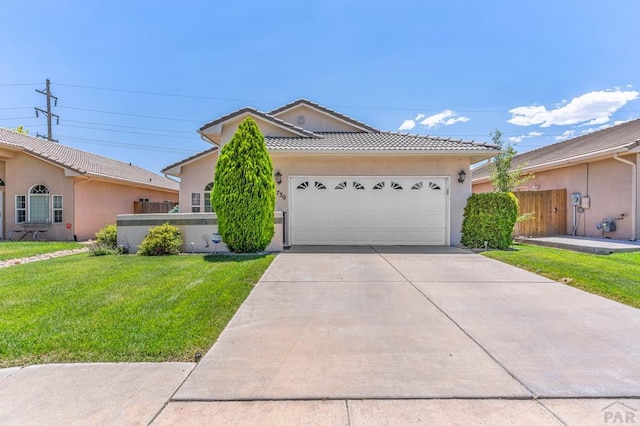 ranch-style home with a front yard, driveway, a tiled roof, and stucco siding