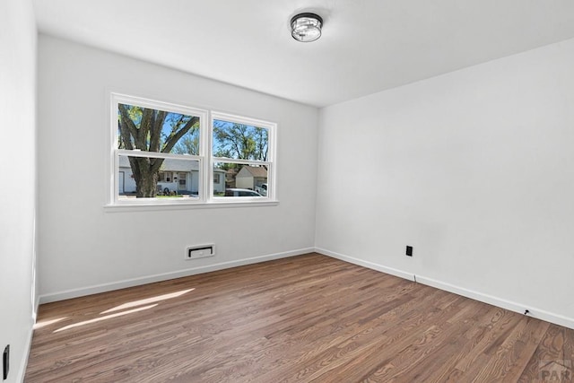 1121 Alexander Cir, Pueblo, CO 81001 - spare room with wood finished floors and baseboards