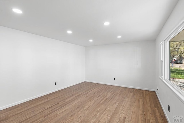 1121 Alexander Cir, Pueblo, CO 81001 - spare room with light wood finished floors, recessed lighting, and baseboards