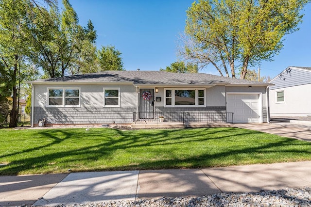 1121 Alexander Cir, Pueblo, CO 81001 - single story home with an attached garage, driveway, a front yard, and stucco siding