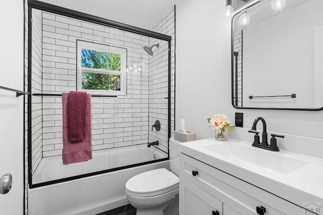 1121 Alexander Cir, Pueblo, CO 81001 - bathroom with toilet, shower / bath combination with glass door, and vanity