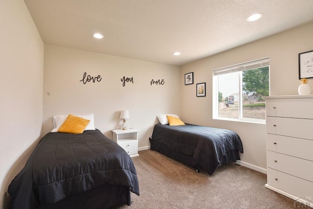 bedroom with baseboards, carpet floors, and recessed lighting