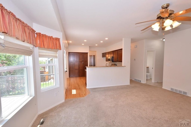1135 Mount Estes Dr, Colorado Springs, CO 80921 - unfurnished living room featuring light carpet, recessed lighting, and ceiling fan
