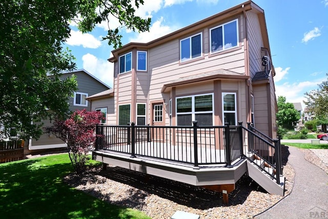 1135 Mount Estes Dr, Colorado Springs, CO 80921 - back of property with a deck