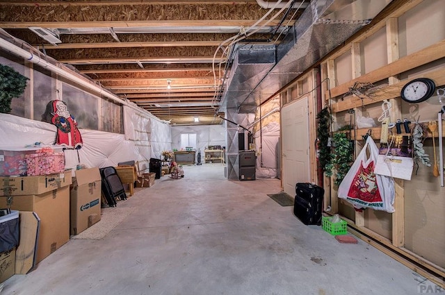 unfinished basement with heating unit