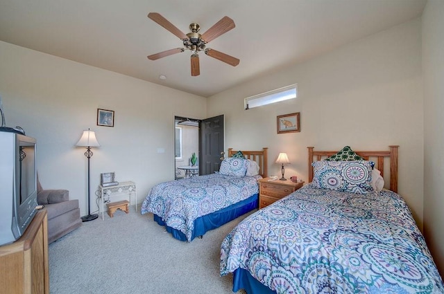 bedroom with ceiling fan and carpet flooring