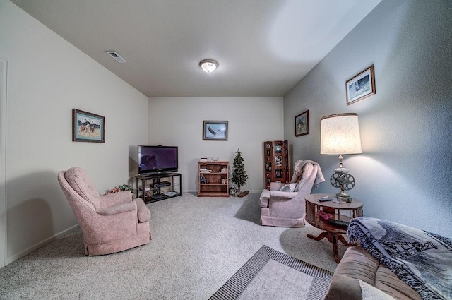 carpeted living room with visible vents