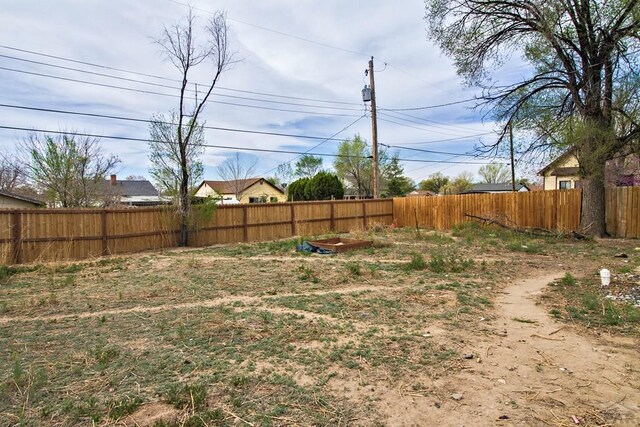 1710 E 3rd St, Pueblo, CO 81001 - view of yard featuring fence