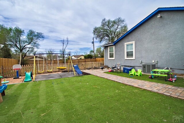 1710 E 3rd St, Pueblo, CO 81001 - view of yard featuring cooling unit, a patio, and fence private yard