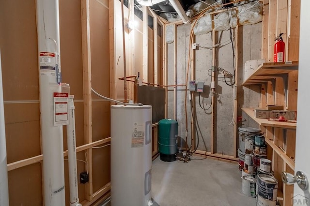 utility room with electric water heater