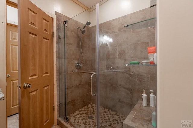 full bathroom featuring a shower stall