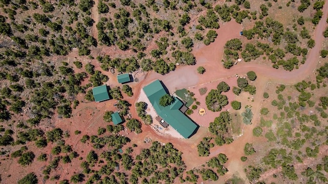 birds eye view of property featuring a desert view