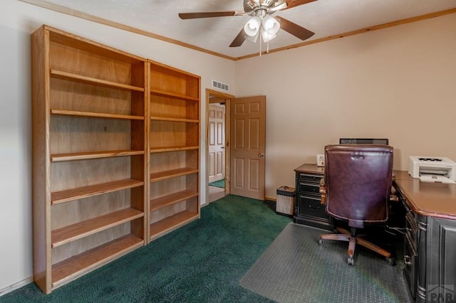 office with ceiling fan, visible vents, baseboards, dark colored carpet, and crown molding