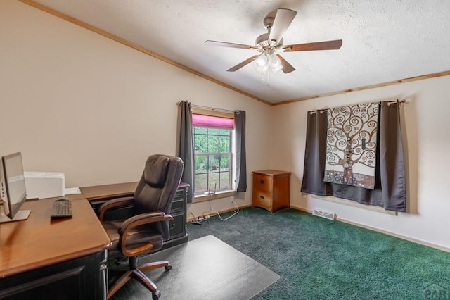 office area featuring a textured ceiling, visible vents, vaulted ceiling, dark colored carpet, and crown molding