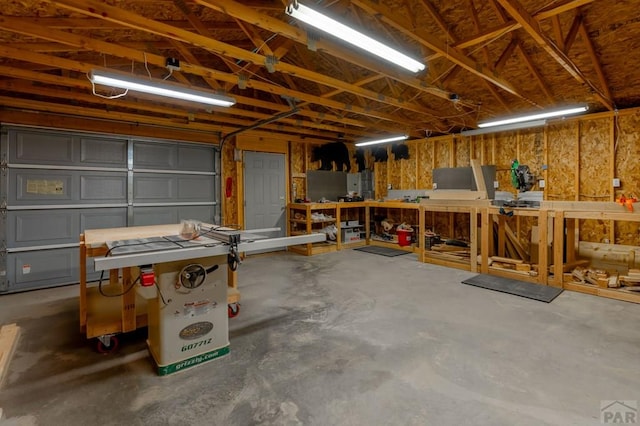 garage with a workshop area