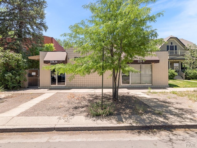 226 W Abriendo Ave, Pueblo, CO 81004 - view of front of house with a gate