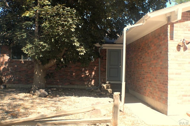 33 Regency Blvd, Pueblo, CO 81005 - entrance to property with brick siding